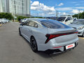 2023 Kia K5 LPi III Рестайлинг, серый - вид 1