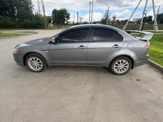 2012 Mitsubishi Lancer X Рестайлинг, серебристый, 930000 рублей, вид 4