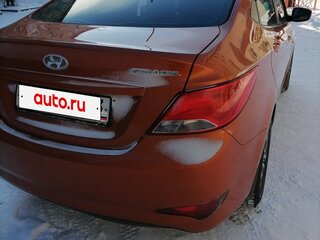 2015 Hyundai Solaris I Рестайлинг, оранжевый, 930000 рублей, вид 3