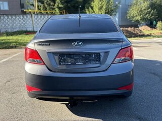 2014 Hyundai Solaris I Рестайлинг, серый, 676500 рублей, вид 4