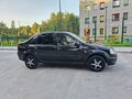 2011 Renault Logan I Рестайлинг, чёрный - вид 3