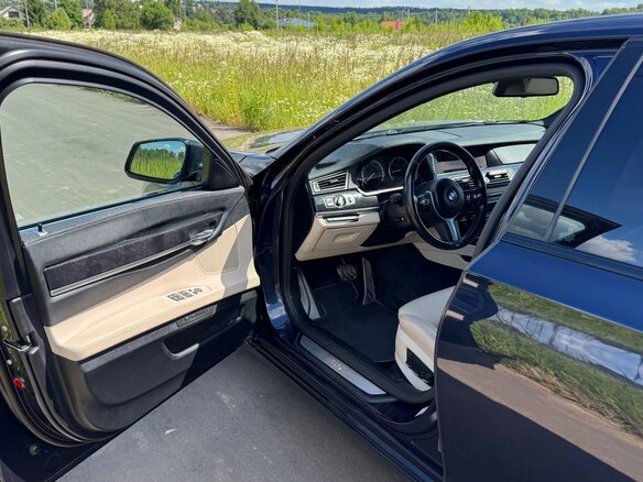 2010 BMW 7 серии 740d xDrive V (F01/F02/F04), синий, 1800000 рублей - вид 7