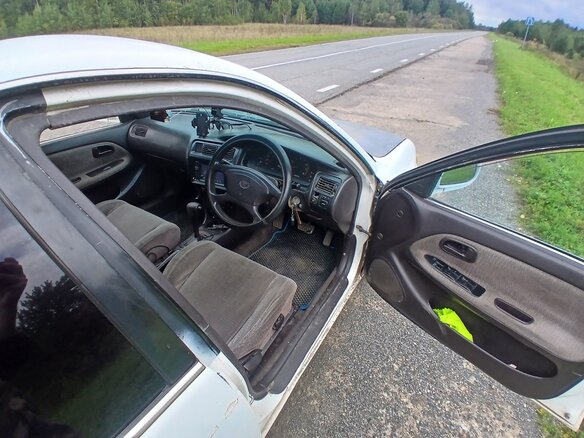 1991 Toyota Corolla VII (E100), белый, 180000 рублей - вид 6