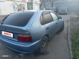 1995 Toyota Corolla VII (E100), синий, 250000 рублей, вид 3