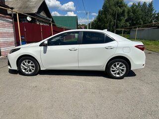 2018 Toyota Corolla XI (E160, E170, E180) Рестайлинг 1, белый, 1690000 рублей, вид 4