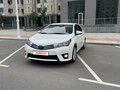 2013 Toyota Corolla XI (E160, E170, E180), белый, 1150000 рублей - вид 1