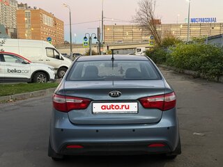 2014 Kia Rio 6-speed III, голубой, 750000 рублей, вид 5