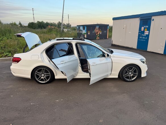 2014 Mercedes-Benz E-Класс 200 IV (W212, S212, C207) Рестайлинг, белый - вид 2