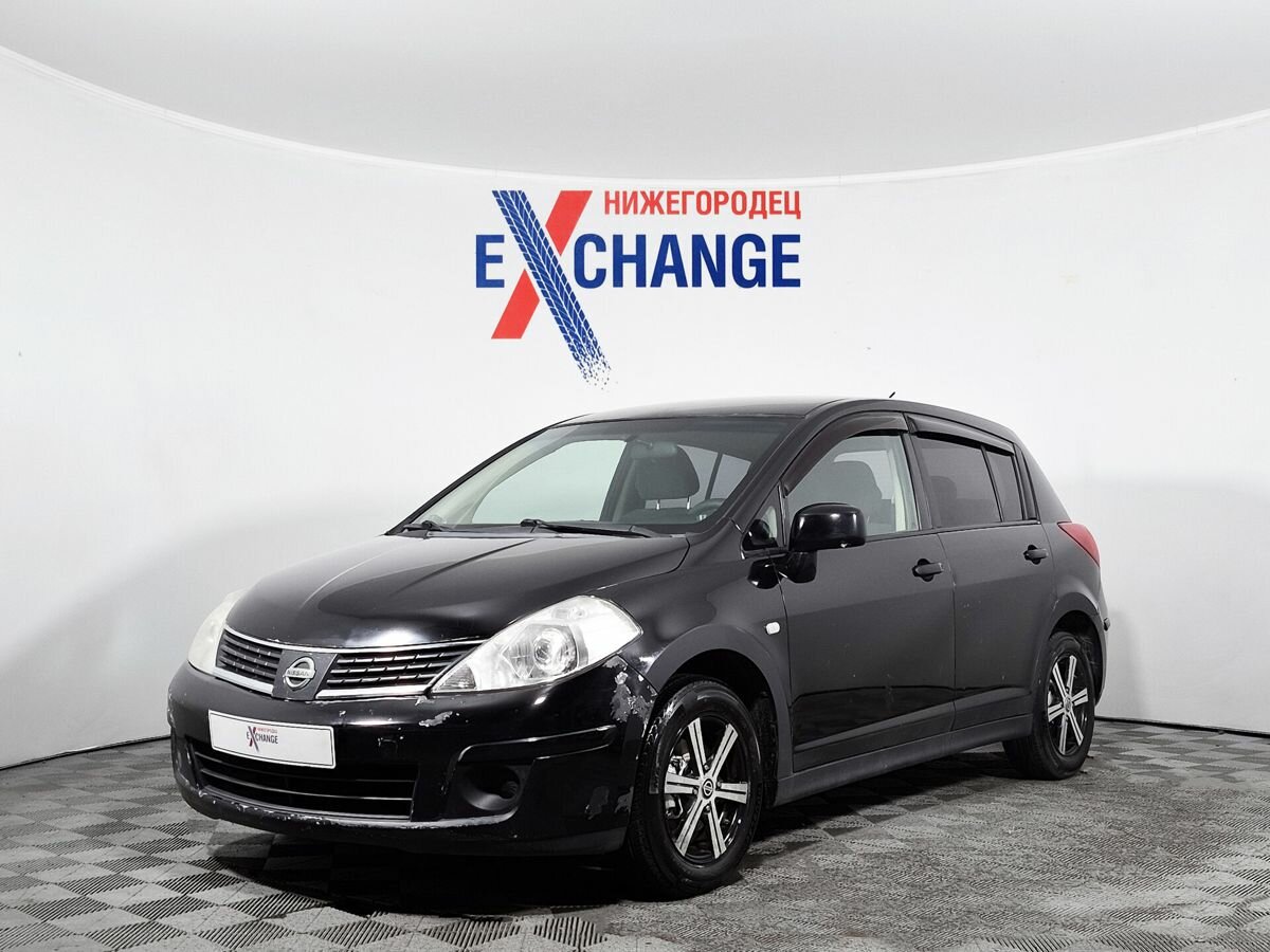Открыть фотографии: Nissan Tiida I