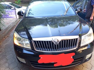 2010 Skoda Octavia DSG7 II (A5) Рестайлинг, чёрный, 899999 рублей, вид 1