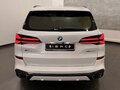 2025 BMW X5 40d IV (G05/G18) Рестайлинг, белый - вид 4