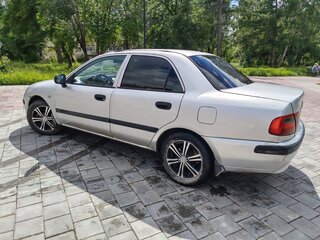 2001 Mitsubishi Carisma I Рестайлинг, серебристый, 180000 рублей, вид 4