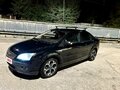 2006 Ford Focus II, чёрный - вид 2