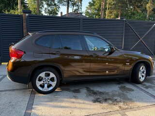 2011 BMW X1 18i I (E84), коричневый, 1350000 рублей, вид 3