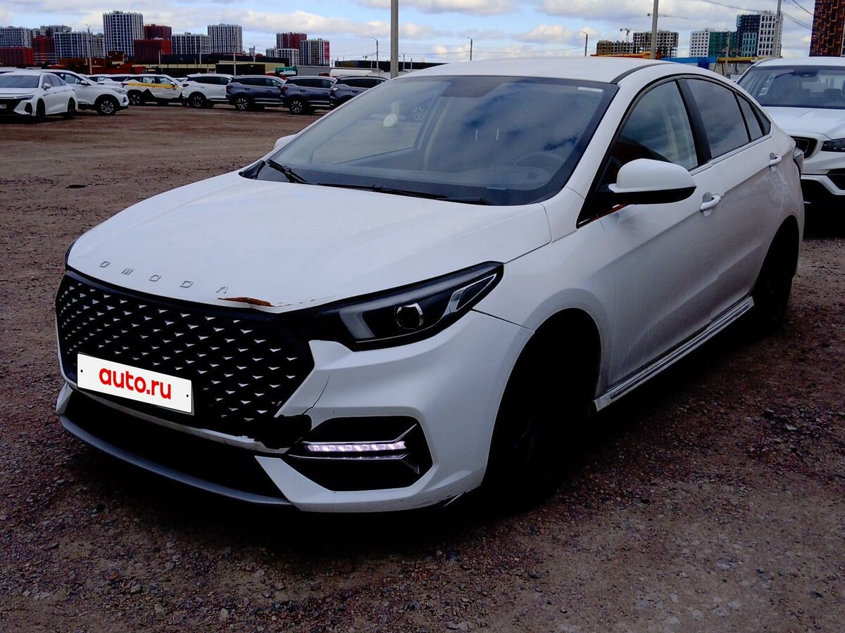 Открыть фотографии: Omoda S5
