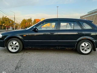 1999 Mazda 323 VI (BJ), чёрный, 150000 рублей, вид 2