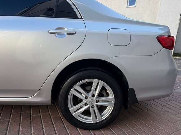 2010 Toyota Corolla X (E140, E150) Рестайлинг, серебристый, 900000 рублей - вид 13