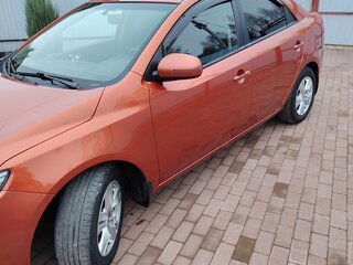 2011 Kia Cerato 6-speed II, оранжевый, 950000 рублей, вид 2