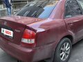 2001 Mazda Protege III (BJ), красный, 215000 рублей - вид 2