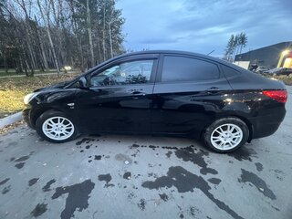 2014 Hyundai Solaris I, чёрный, 730000 рублей, вид 2