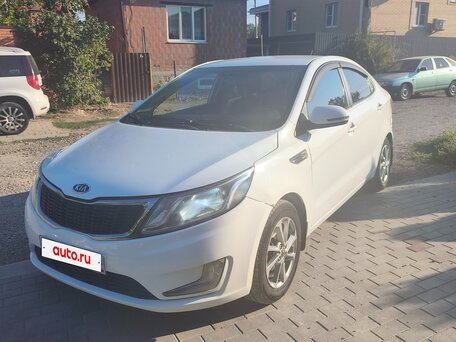 2012 Kia Rio 4-speed III, белый, 700000 рублей, вид 1