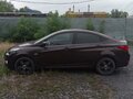 2015 Hyundai Solaris I Рестайлинг, коричневый, 880000 рублей - вид 4