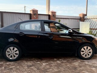 2013 Kia Rio 5-speed III, чёрный, 660000 рублей, вид 5