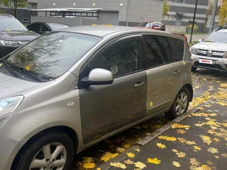 2011 Nissan Note I Рестайлинг, серебристый, 359000 рублей, вид 1