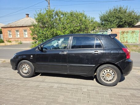 2002 Toyota Corolla IX (E120, E130), чёрный, вид 2