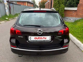 2014 Opel Astra J Рестайлинг, коричневый, 735000 рублей, вид 4