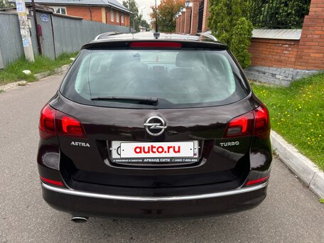 2014 Opel Astra J Рестайлинг, коричневый, 735000 рублей, вид 4