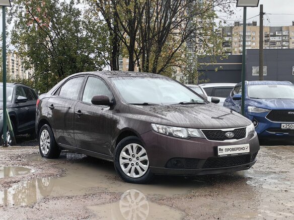 2010 Kia Cerato 6-speed II, фиолетовый, 469000 рублей - вид 3