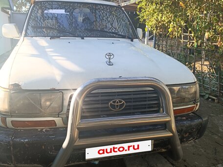 1996 Toyota Land Cruiser 80 Series, белый, вид 1