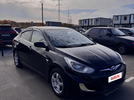 2012 Hyundai Solaris I, чёрный, 630000 рублей, вид 3