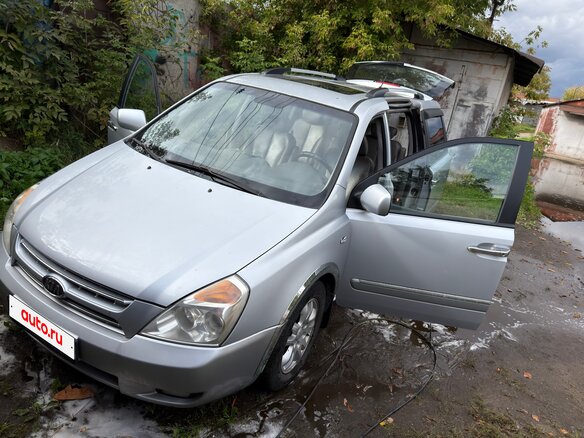 2009 Kia Carnival Grand II, серый, 900000 рублей - вид 1
