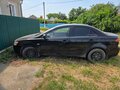 2010 Mitsubishi Lancer X, чёрный, 414000 рублей - вид 3