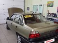 2005 Daewoo Nexia I, жёлтый - вид 3