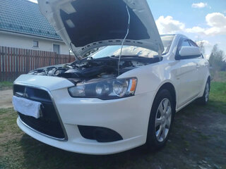 2013 Mitsubishi Lancer X Рестайлинг, белый, 1100000 рублей, вид 2