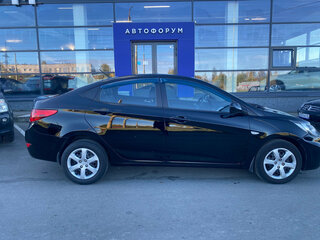 2012 Hyundai Solaris I, чёрный, 745000 рублей, вид 4