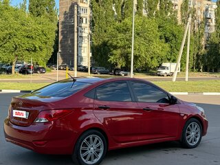 2014 Hyundai Solaris I, пурпурный, 675000 рублей, вид 4