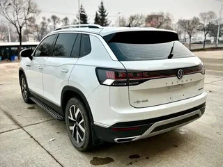 2023 Volkswagen Tayron I Рестайлинг, белый, 2220000 рублей, вид 4