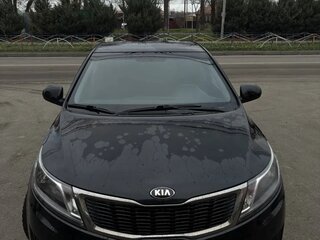2011 Kia Rio III, чёрный, 650000 рублей, вид 3