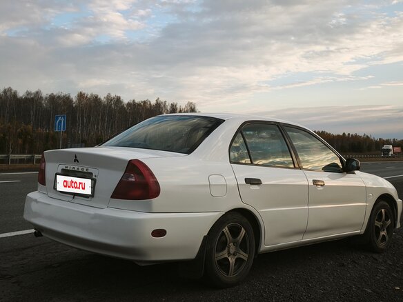 2000 Mitsubishi Mirage V, белый, 280000 рублей - вид 2