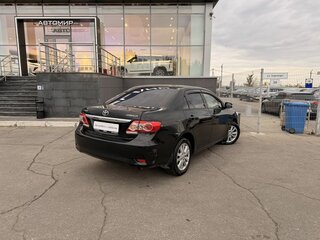 2010 Toyota Corolla X (E140, E150) Рестайлинг, чёрный, 1070000 рублей, вид 5
