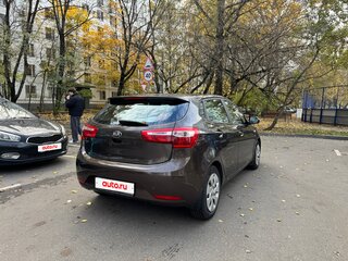 2014 Kia Rio 6-speed III, коричневый, 850000 рублей, вид 5