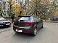 2014 Kia Rio 6-speed III, коричневый, 850000 рублей - вид 4