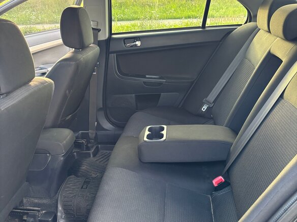 2010 Mitsubishi Lancer X, чёрный, 720000 рублей - вид 14