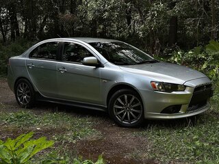 2012 Mitsubishi Lancer X Рестайлинг, серебристый, 700000 рублей, вид 1