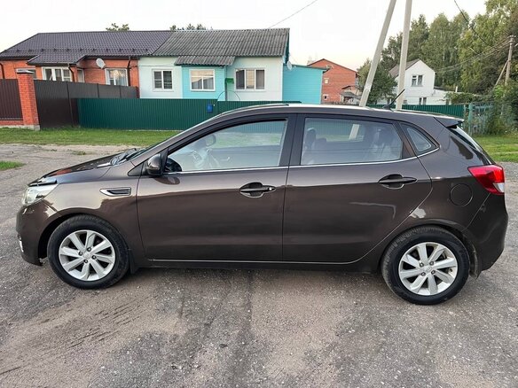 2015 Kia Rio III Рестайлинг, коричневый, 630000 рублей - вид 9