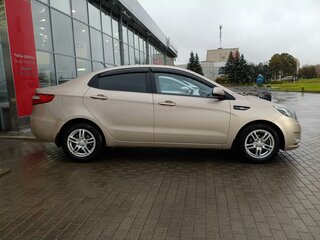 2014 Kia Rio 6-speed III, бежевый, 1050000 рублей, вид 4